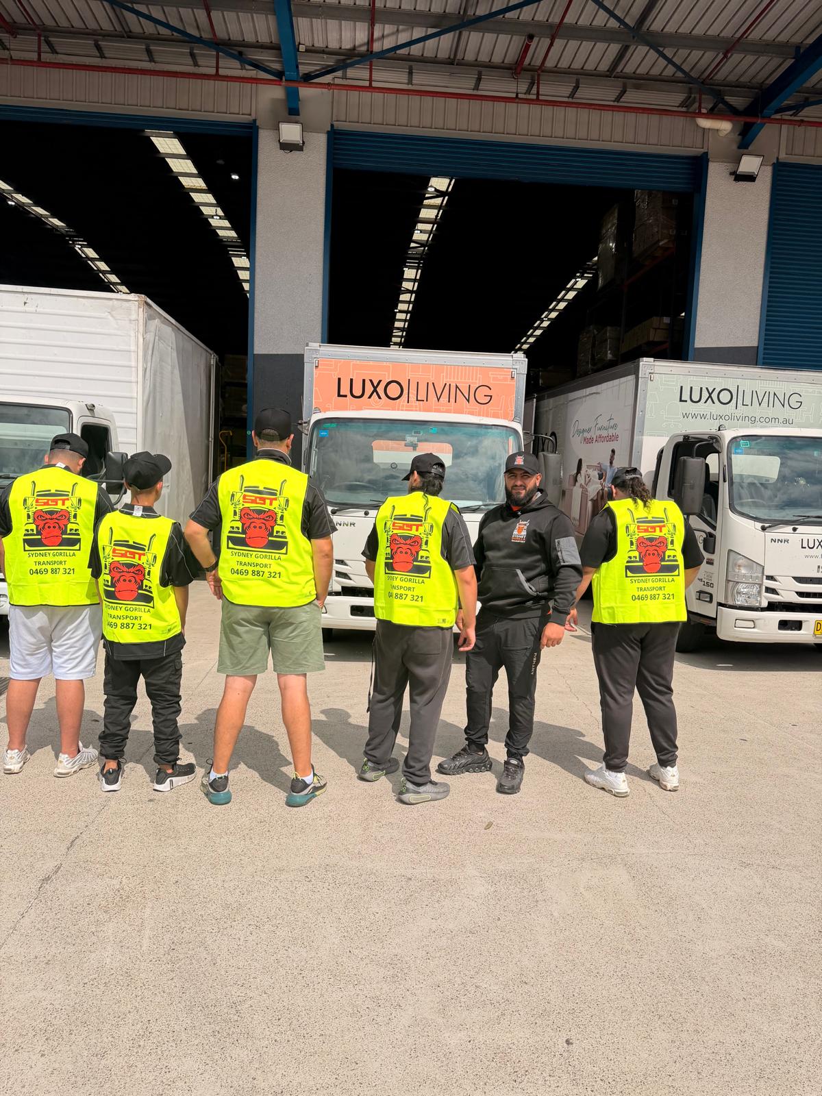 Sydney Gorilla Transport crew from behind at warehouse